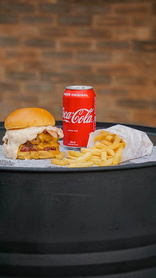 Free Burger and Fries on a Table Stock Photo