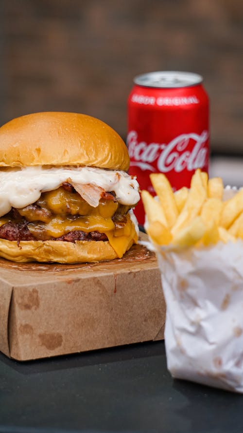 Foto profissional grátis de coca, Coca Cola, comida rápida