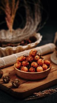 Deliciously spiced roasted chickpeas in a rustic setting, perfect as a healthy snack.