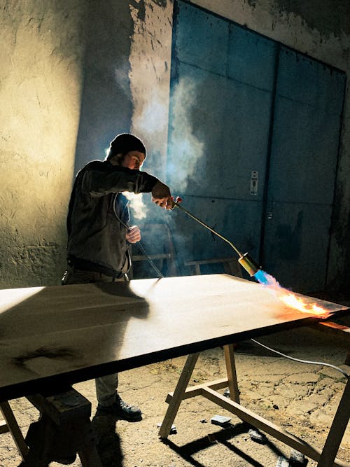 Foto profissional grátis de homem, metalurgia, solda