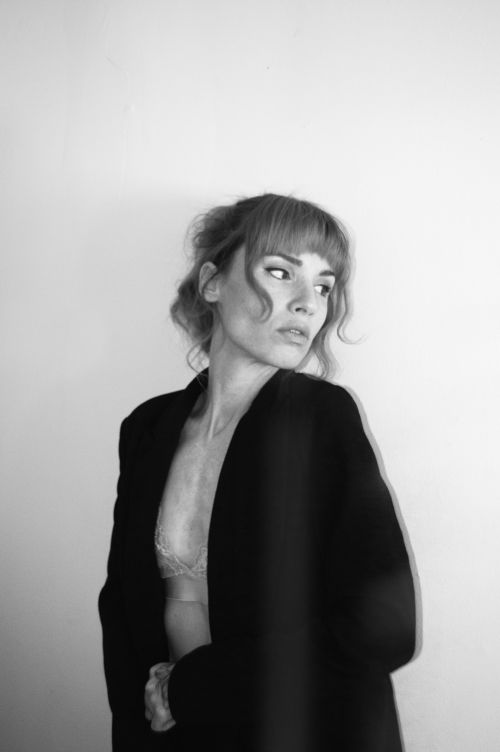 Free Monochrome portrait of a woman in a blazer, stylish and sophisticated. Stock Photo