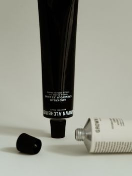 Elegant photo of luxury hand cream tubes perfect for skincare and beauty.
