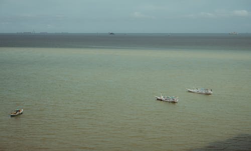 Free White Boat on Sea Stock Photo