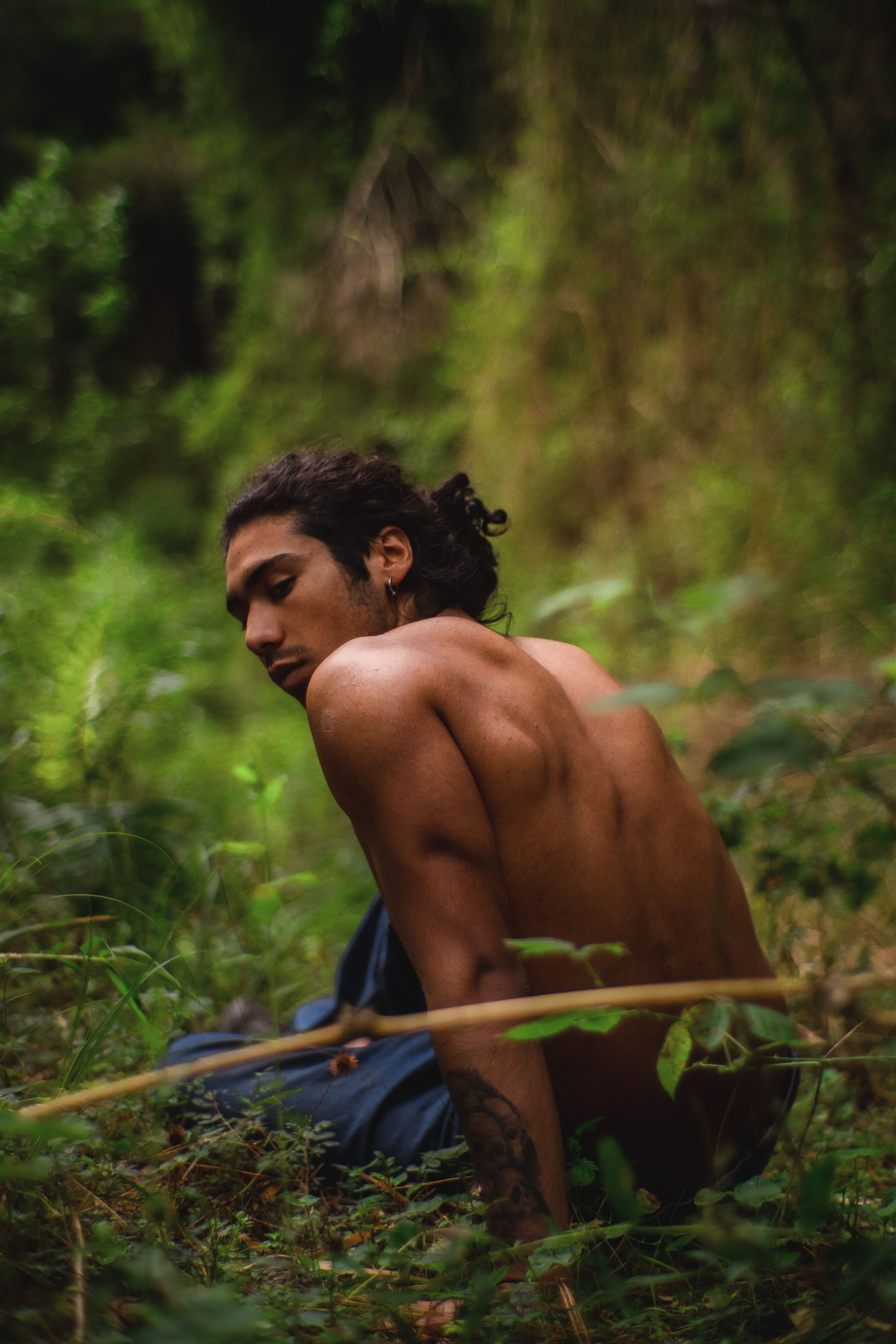 a-shirtless-man-in-the-woods-free-stock-photo