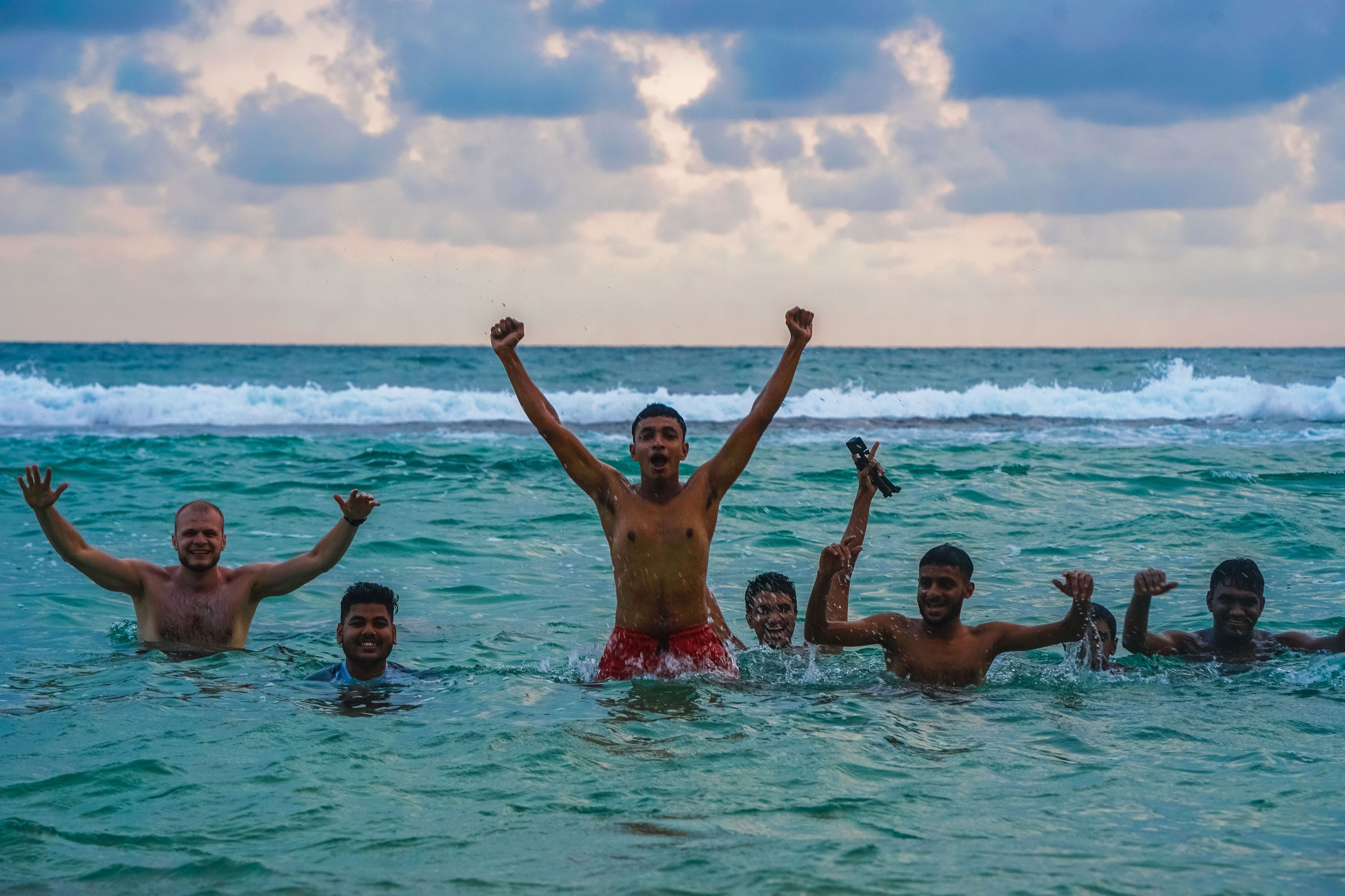 Group of Men Having Fun in the Beach · Free Stock Photo