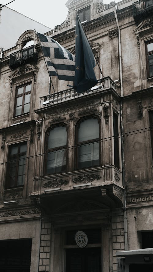 건물 외관, 깃발, 도시의 무료 스톡 사진