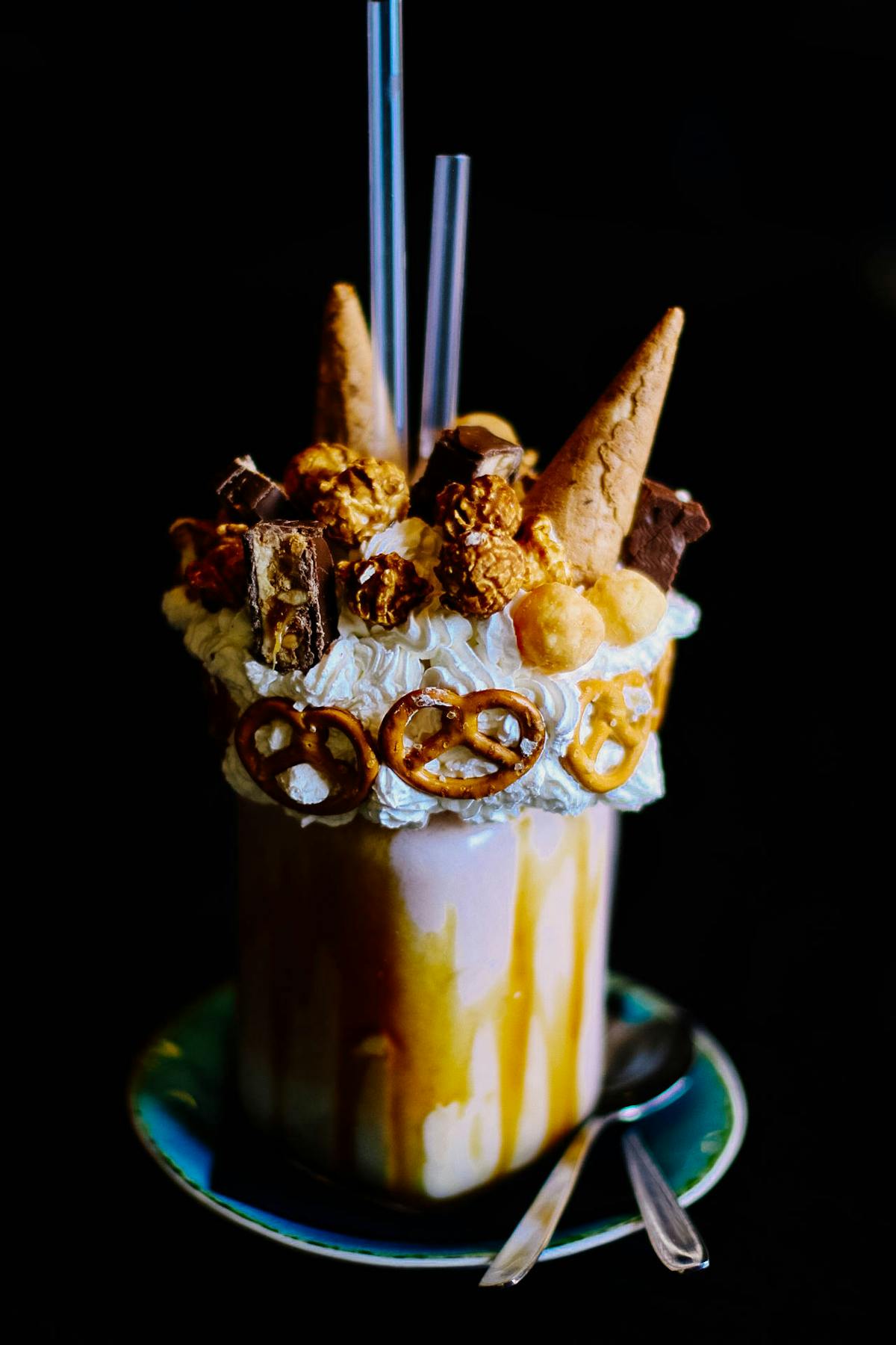 Sliced grilled chicken breast on a cutting board with herbs