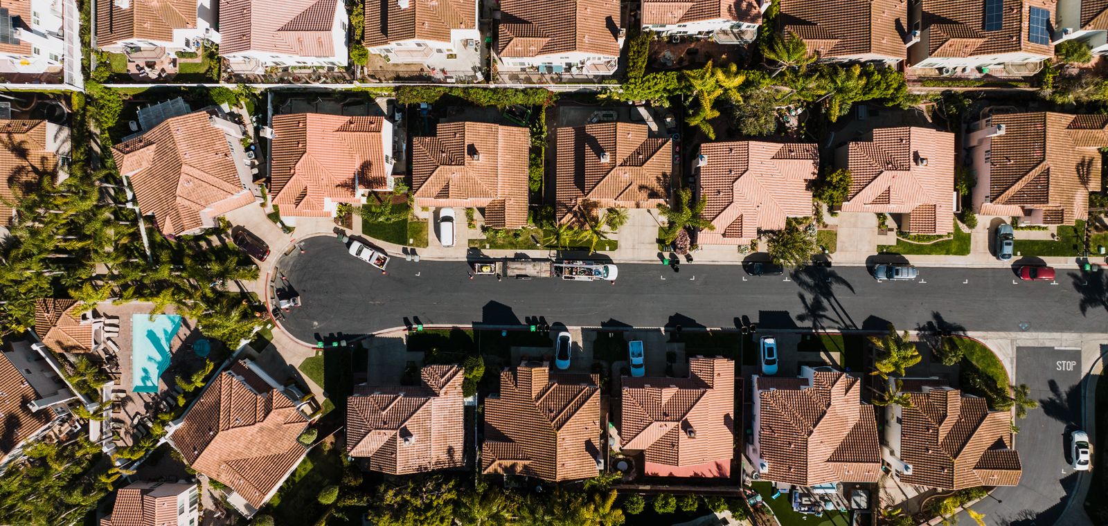 Drone view of suburban rooftops in California