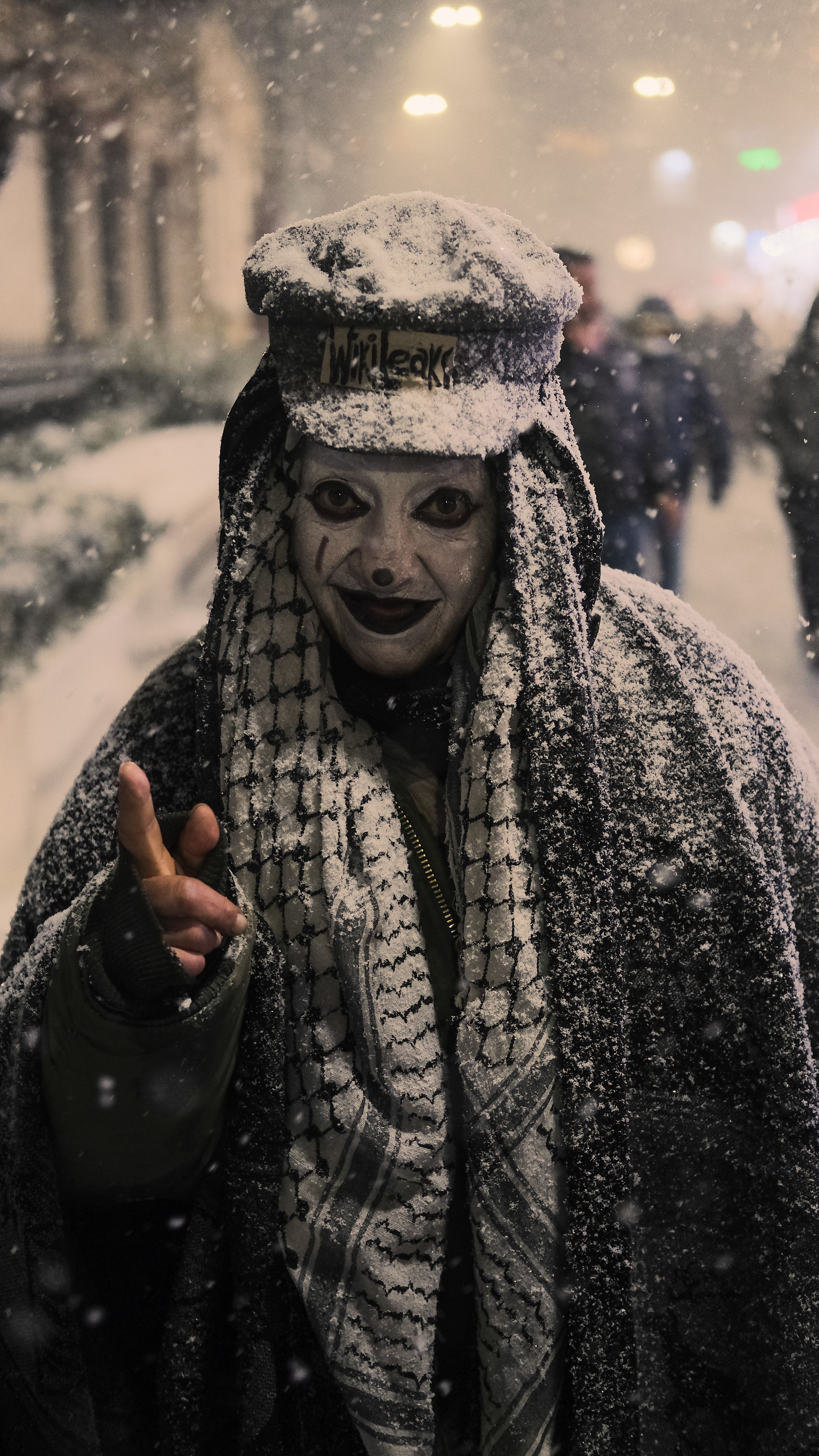 Man in a Costume on the Street at Snowfall · Free Stock Photo