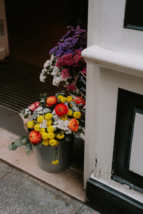 Colorful Flowers in Buckets