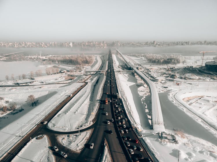 
An Aerial Shot Of A Highway During Winter