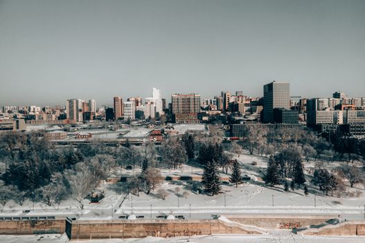 Aerial view of the snow-covered cityscape of Novosibirsk, featuring dramatic winter scenery.