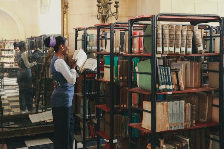 A Woman In A Library
