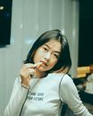 Woman in White Long Sleeve Shirt
