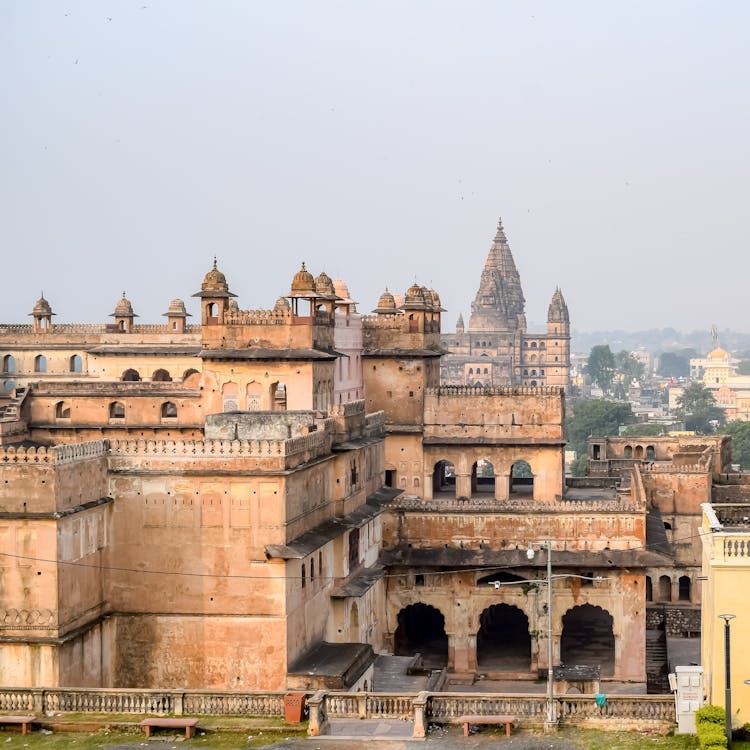The Raja Mahal And The Chaturbhuj Temple In India