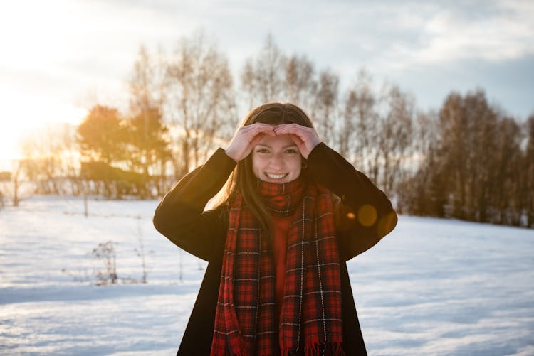 Woman Wearing Plaid Scarf Smiling