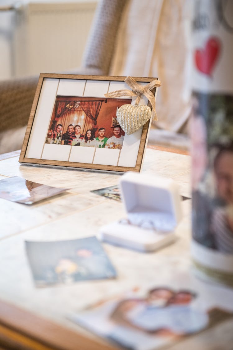 Framed Picture On The Table Showing Friends