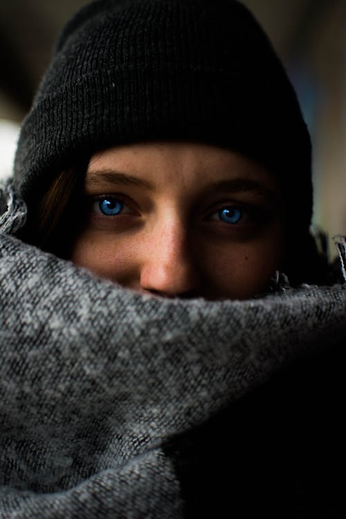Free Woman Wearing Black Hat With Blue Eyes Stock Photo