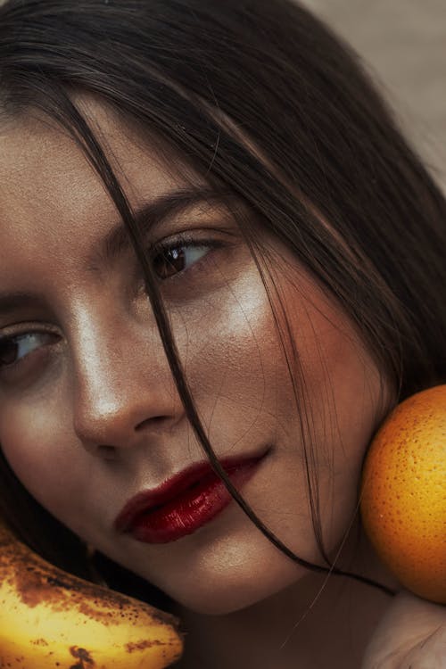 Close Up Photo of Woman with Red Lips