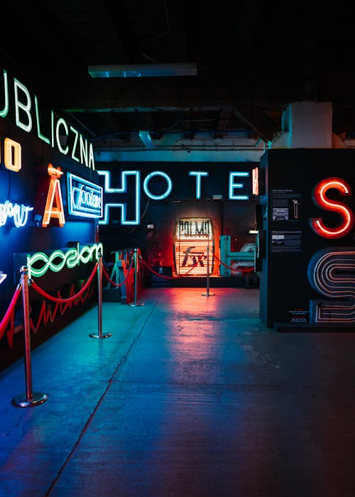 Glowing Neon Signs on Walls of a Museum