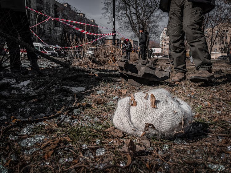 Knitted Hat Lying Among Debris In Ukrainian City