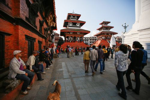 Free A bustling scene at Kathmandu Durbar Square, showcasing traditional architecture and diverse crowds. Stock Photo