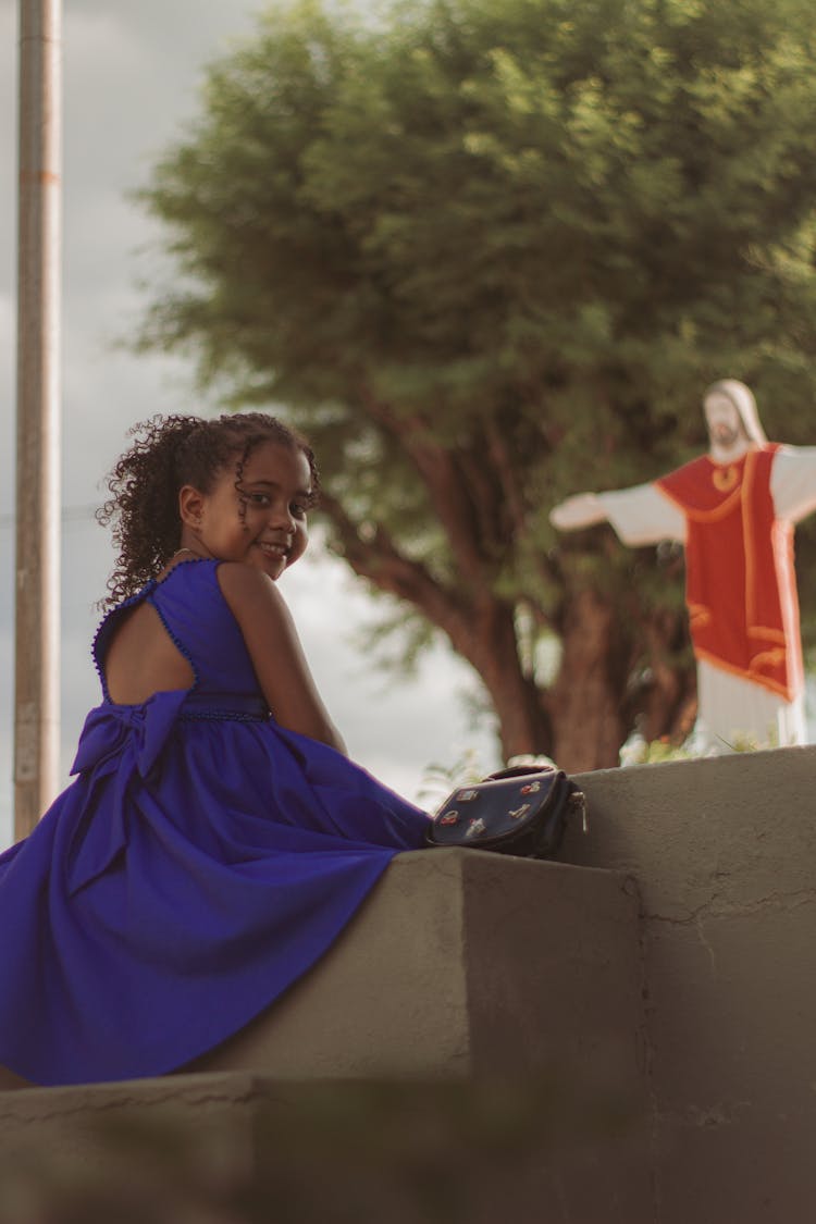 Girl Sitting On Steps