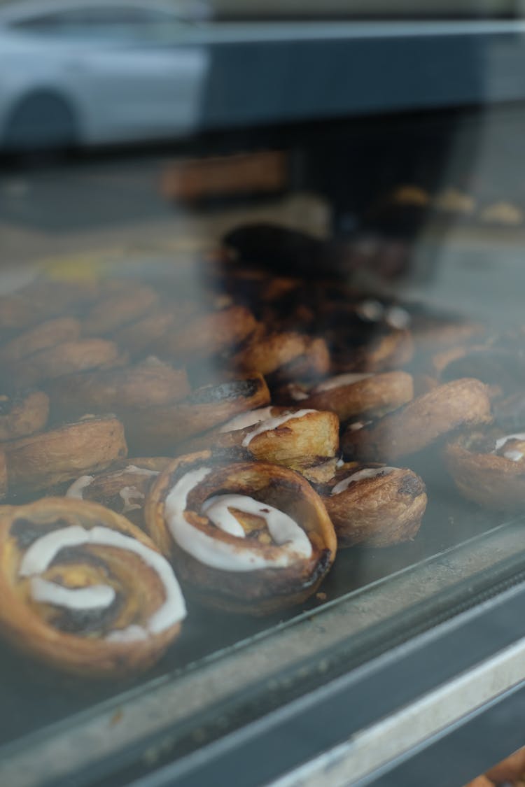 Cake Swirls Behind A Glass Window