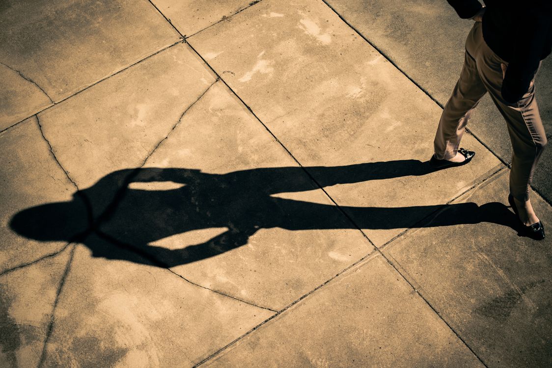 Shadow of a Person on Gray Concrete Floor · Free Stock Photo