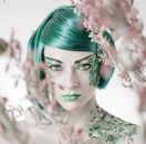 Woman in Pink and Green Floral Dress