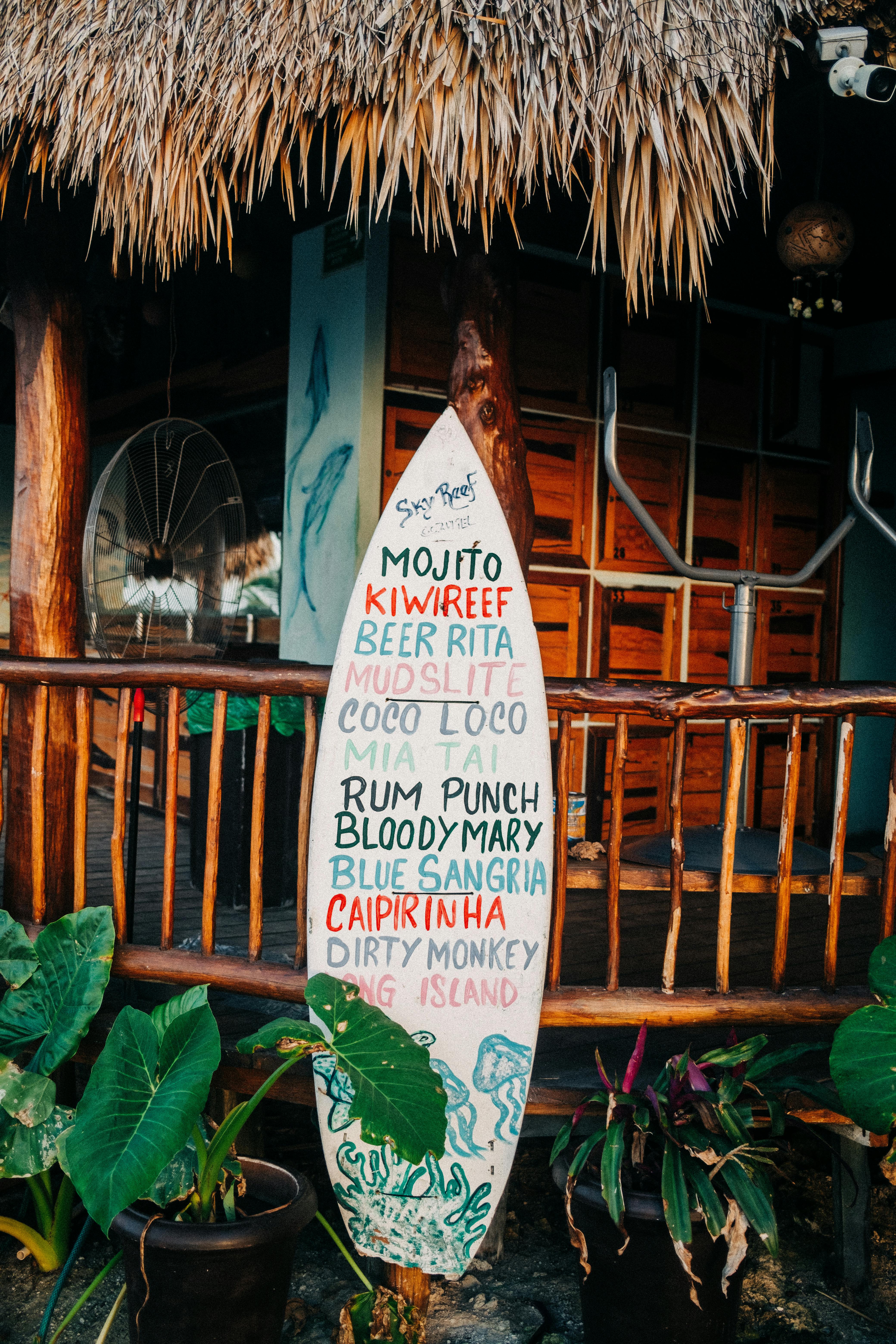 mexican pub menu on surfboard