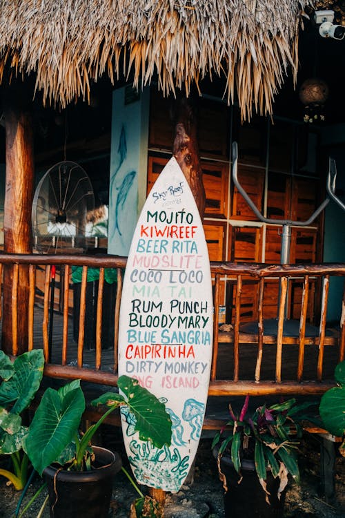 Free Mexican Pub Menu on Surfboard Stock Photo