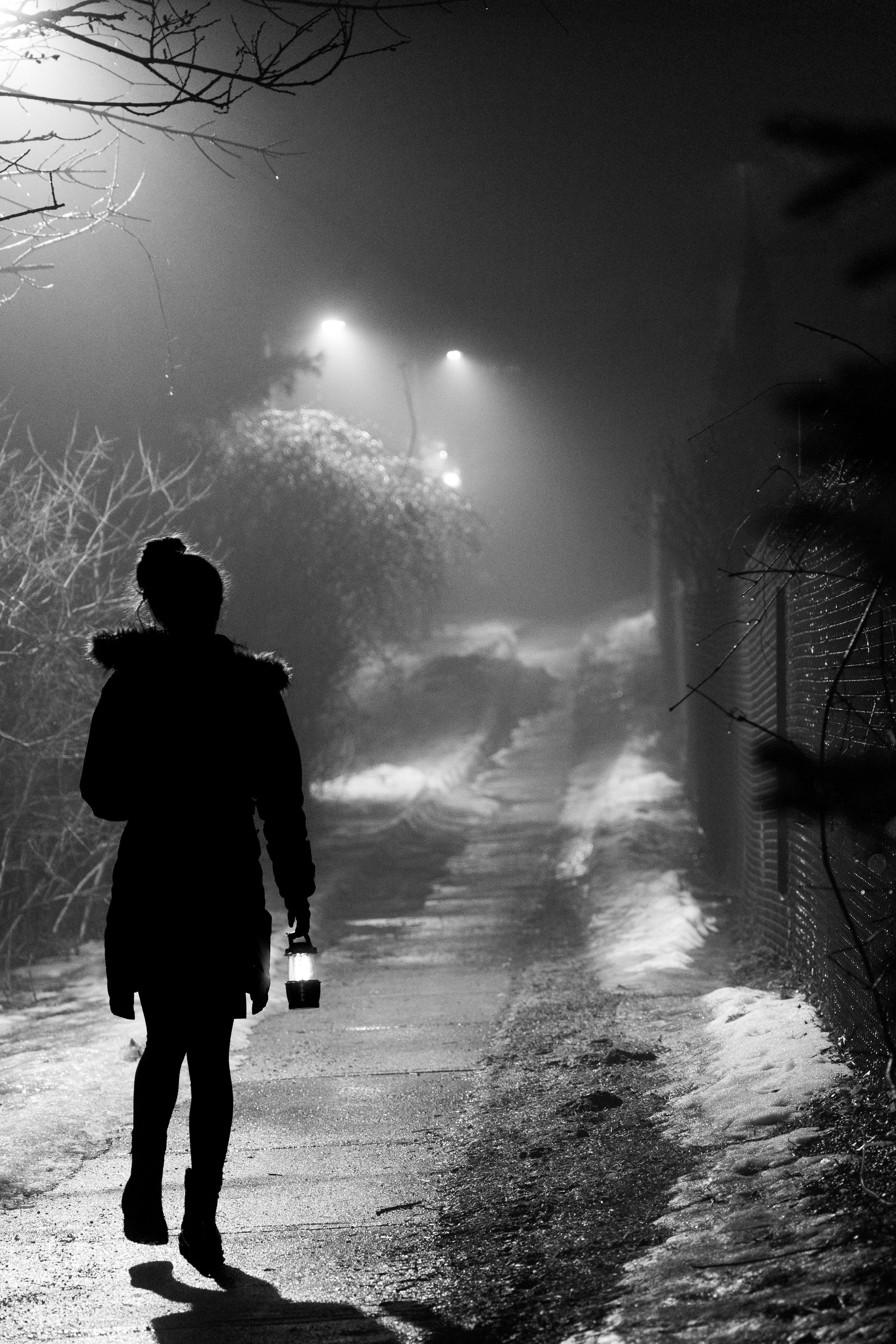 A Person in Black Coat Walking on a Pathway · Free Stock Photo