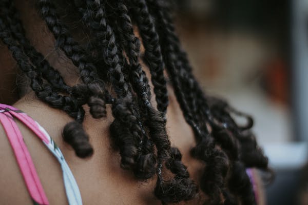 Close-up of braiding hair