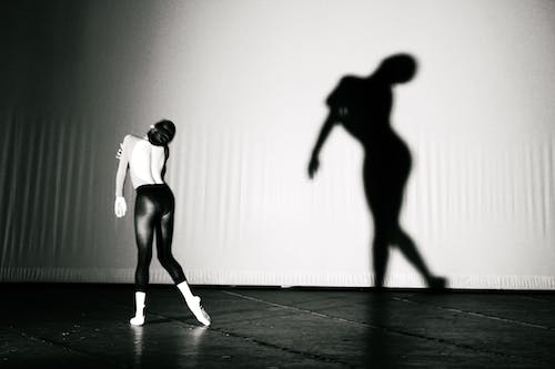 Black and White Photo of Ballet Dancer with Her Shadow
