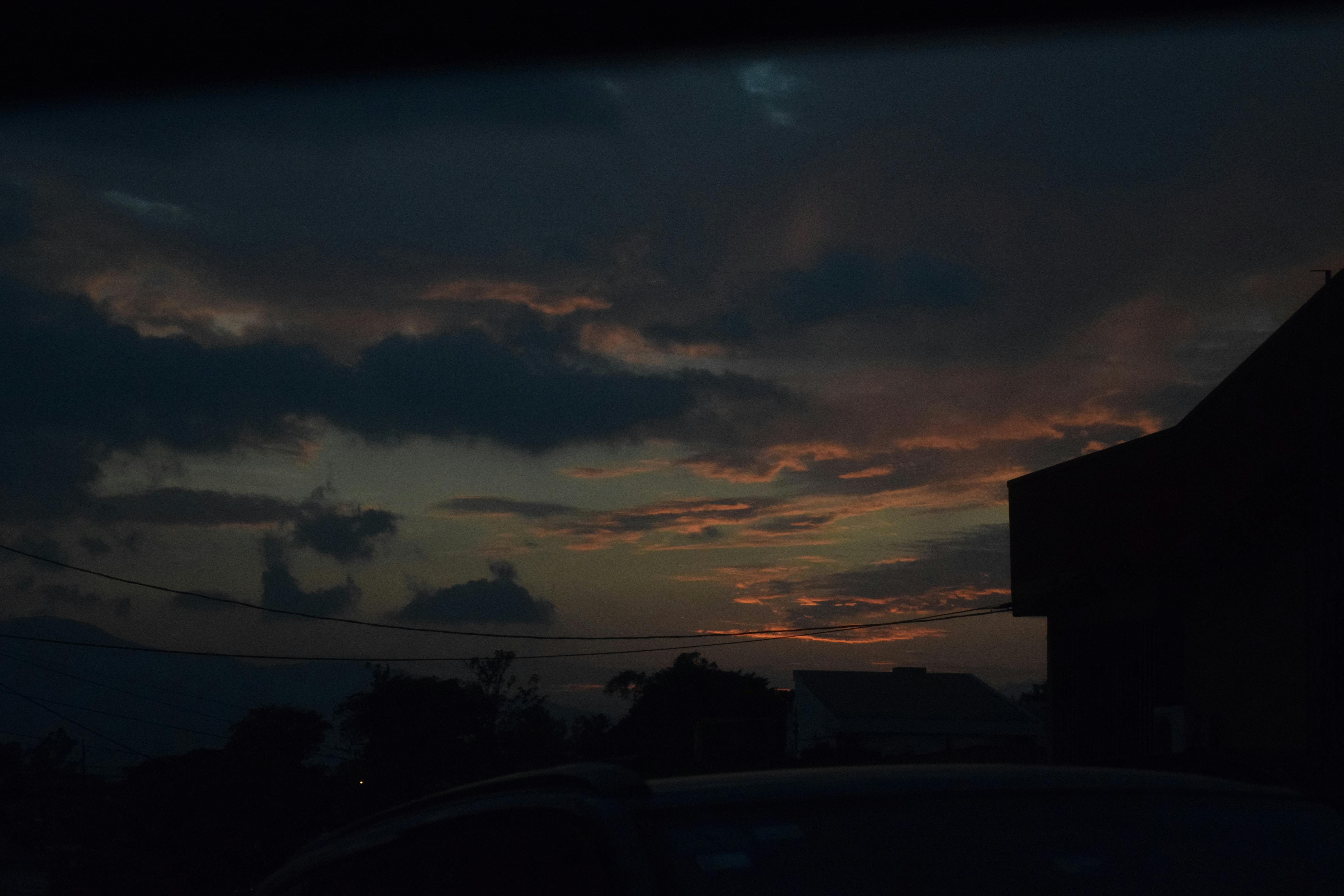 Rugby player sprinting with the ball pursued by defenders