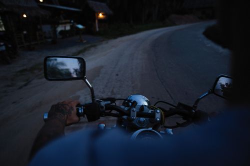 Free Experience the thrill of a motorcycle ride at dusk, capturing the essence of freedom and adventure. Stock Photo