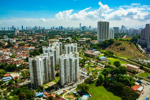 A stunning aerial view of Air Itam in Penang, Malaysia, showcasing its urban cityscape and surrounding landscape.