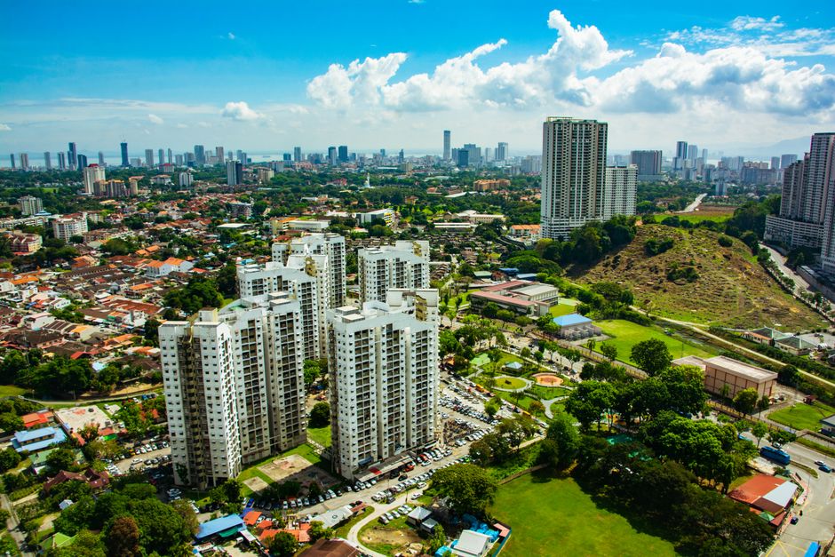 A stunning aerial view of Air Itam in Penang, Malaysia, showcasing its urban cityscape and surrounding landscape.