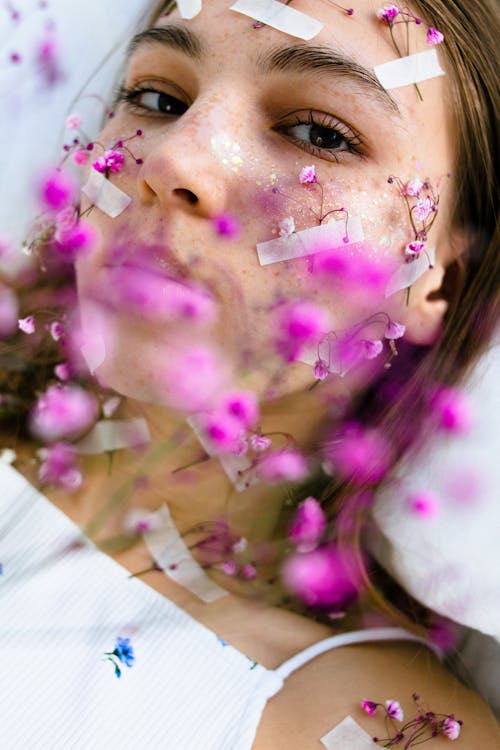 Free Woman With Purple and White Flower on Her Face Stock Photo