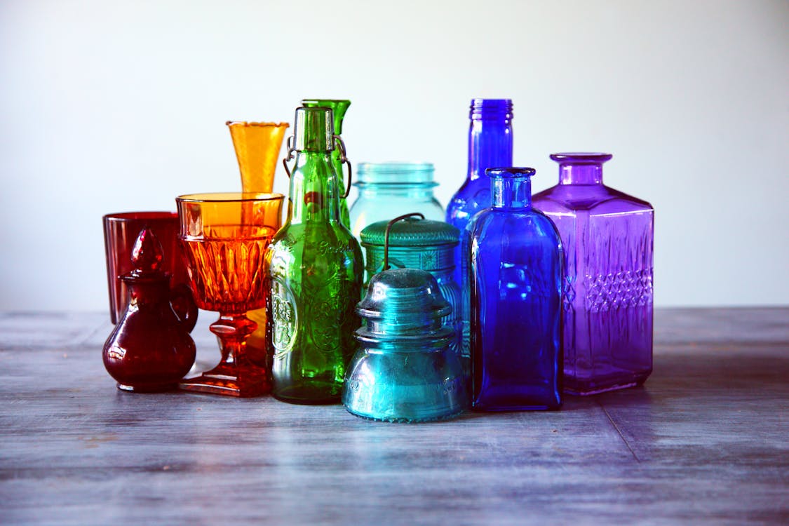 Free Assorted-color Translucent Glass Containers Stock Photo
