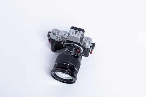 Free A Camera on White Surface Stock Photo