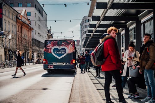 People Standing on Bus Stop