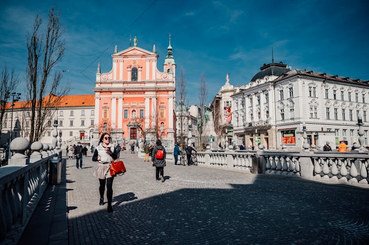 Photo Of Pedestrians Walking In A City 