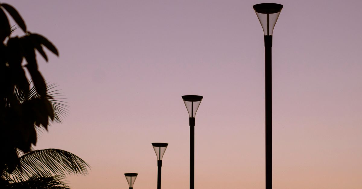 Light Posts Sunset Black Street Light Posts during Sunset · Free Stock Photo