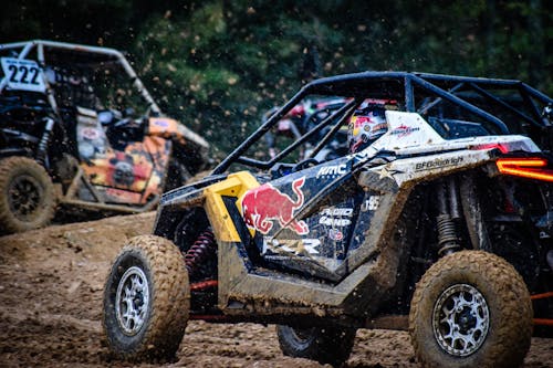 Black and Yellow Monster Truck on Dirt Road