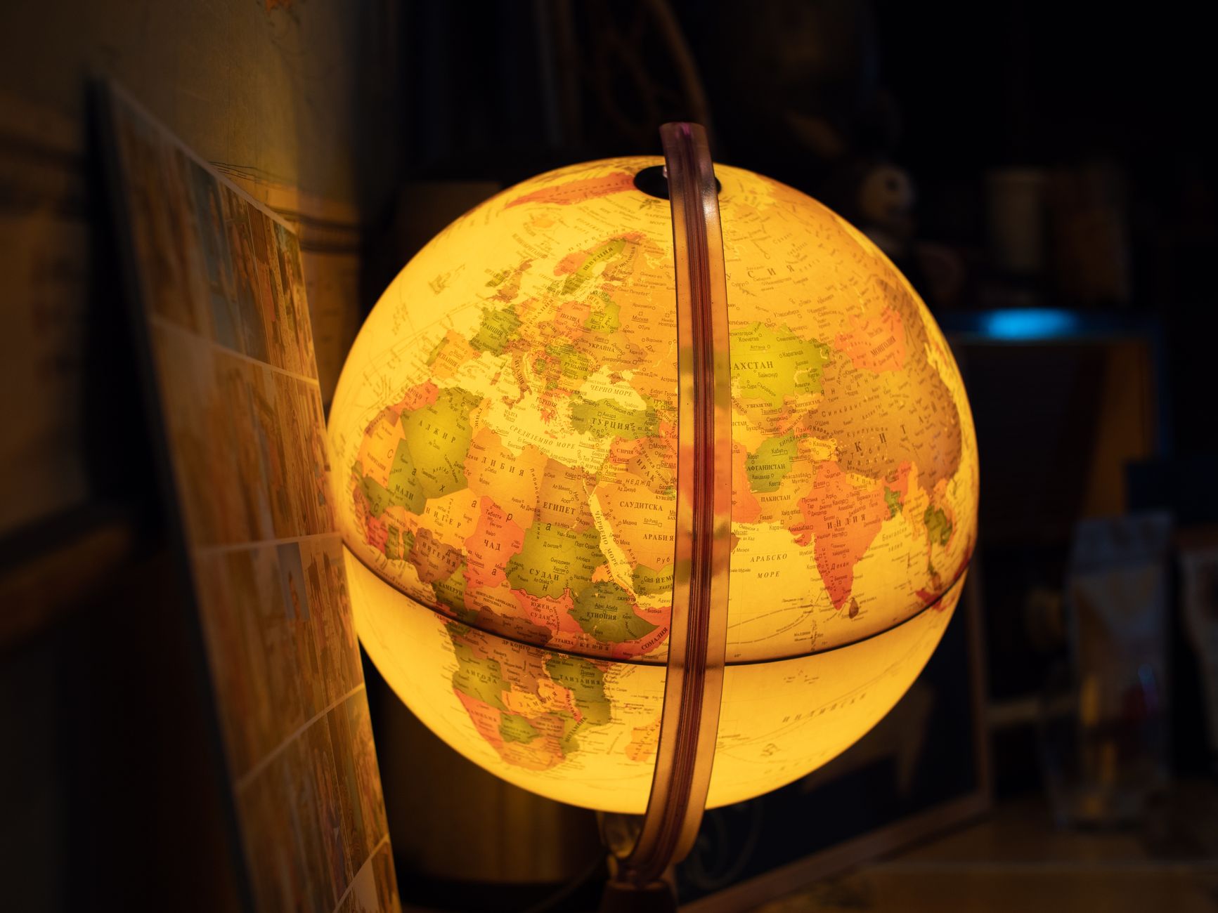 Close-up of a glowing world globe emphasizing geography and learning.