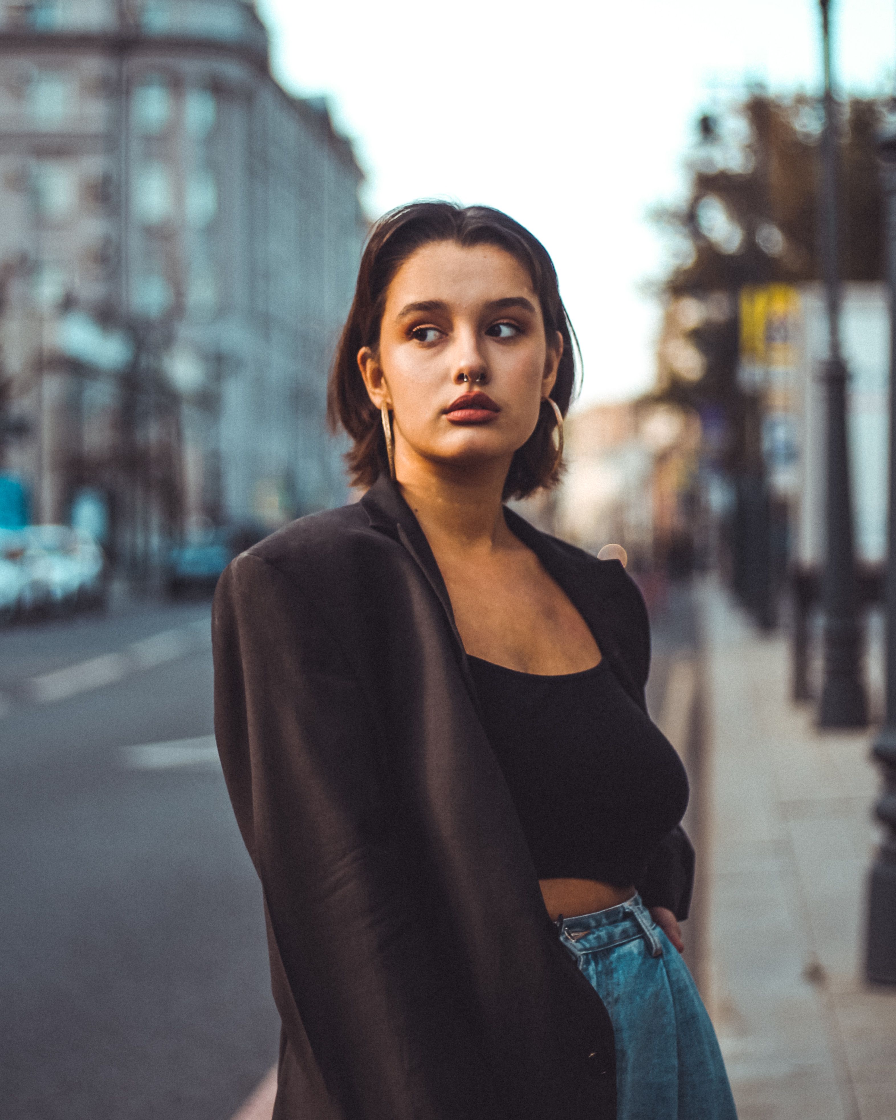 Portrait of Woman in Black Jacket on Street · Free Stock Photo