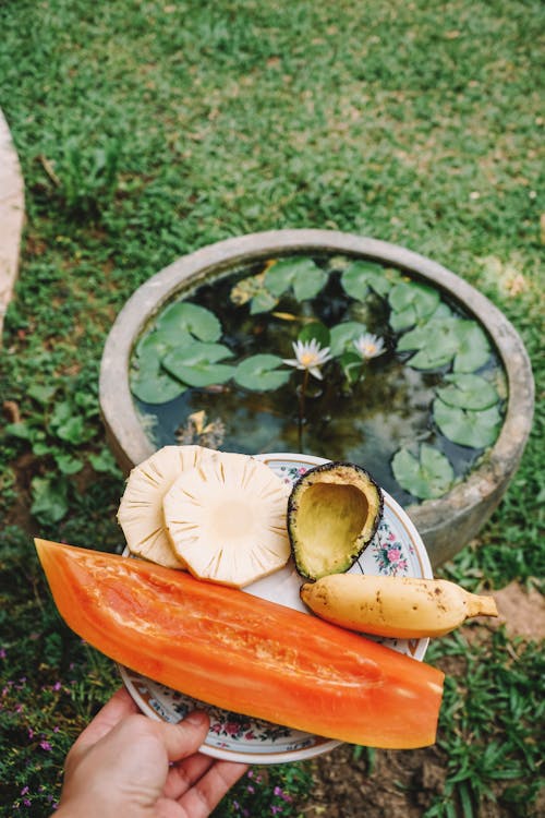 Yellow Banana Fruit on White Floral Round Plate