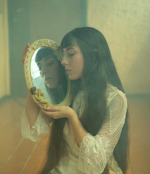 Woman with her Reflection in the Mirror 